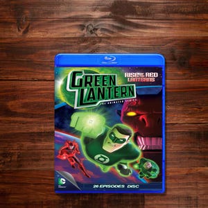 May include: A blue Blu-ray disc case for "Green Lantern: The Animated Series." The cover features the title in green and white, with images of Green Lantern and other characters. The text "Rise of the Red Lanterns" is also visible.