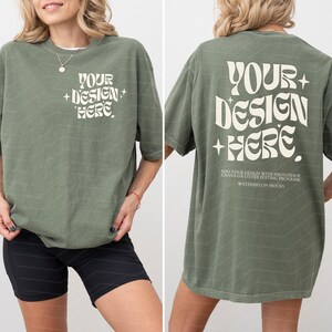 May include: An oversized green t-shirt with the text "YOUR + DESIGN + HERE" printed on the front and back. The shirt is made from a soft, comfortable material and has a relaxed fit.