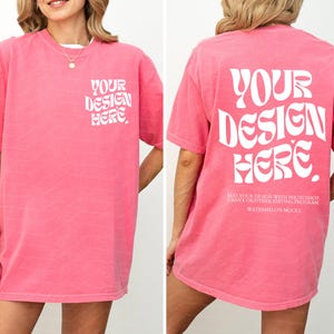 May include: An oversized pink t-shirt with the text "YOUR DESIGN HERE." printed in white on the front and back. The shirt is made from a soft, comfortable material and has a relaxed fit.