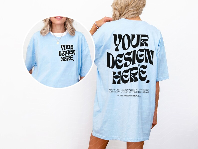 May include: A light blue oversized t-shirt with the text "YOUR DESIGN HERE" in a retro font on the back. The text "ADD YOUR DESIGN WITH PHOTOSHOP, CANVA OR OTHER EDITING PROGRAM WATERMELON MOCKS" is printed below the design.