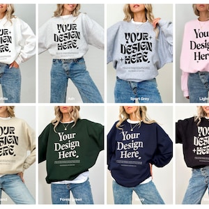 May include: A mockup of a crewneck sweatshirt in ten different colors. The sweatshirt has the text "YOUR+DESIGN+HERE" printed on the front in black.