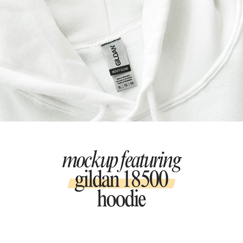 a close up of a white hoodie with a tag on it