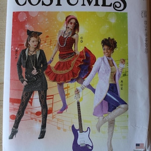 May include: A McCall's Costumes sewing pattern envelope M8224 featuring three individuals in 1980s-style outfits. The cover displays musical notes on a colorful background, a purple electric guitar, and size information E5 (14-16-18-20-22).