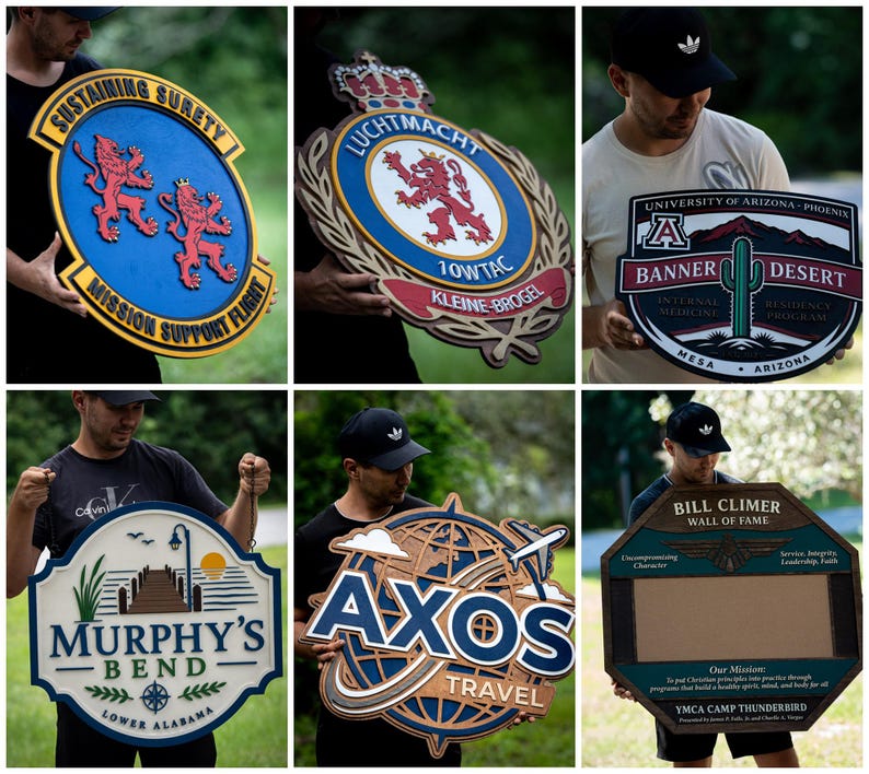 May include: A collection of six custom-made wooden signs featuring various designs, including military emblems, university logos, travel branding, and commemorative plaques with text such as Sustaining Surety, Luchtmacht, Banner Desert, Murphy's Bend, Axos Travel, and Bill Climer Wall of Fame.