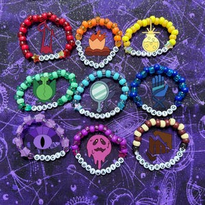 May include: Ten colorful beaded bracelets with charms and words like "Bard", "Beastkeeping", "Potions", "Plant", "Illusion", "Healing", "Oracle", "Abomination", "Construction".