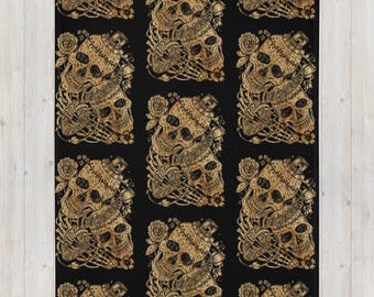 Manta de calavera dorada