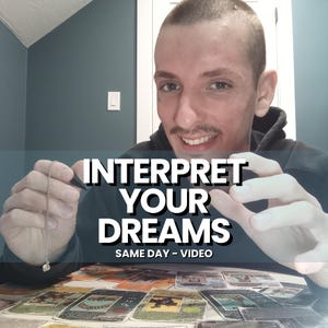 May include: Image features the text "INTERPRET YOUR DREAMS" with "SAME DAY - VIDEO" below it. A person is holding a silver chain with a small pendant over a table with tarot cards. The background is a teal wall and a white door.