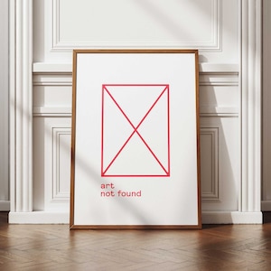 Könnte beinhalten: Ein gerahmter Kunstdruck mit minimalistischem Design. Das Kunstwerk zeigt eine rote rechteckige Form mit einem X, das darüber gezeichnet ist, vor einem weißen Hintergrund. Die Worte "art not found" sind rot darunter gedruckt. Der Rahmen ist warmbraun.