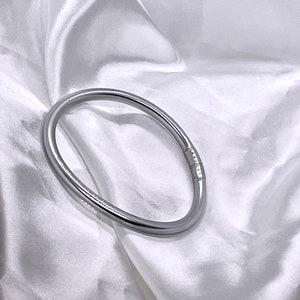 Fine twisted braided Buddhist bangle cheap trendy silver color fashionable bangle bracelet water resistant Buddhist bangles Jonc simple