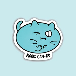May include: A blue cartoon cat with a winking eye and the text "MOOD: CAN-DO" on a white sticker.