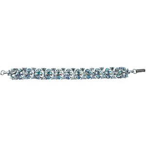 May include: A silver-toned bracelet featuring a series of oval-shaped links, each adorned with iridescent, multi-colored crystals. The bracelet has a secure clasp closure and is designed for wrist wear. The crystals reflect shades of blue, green, and purple.