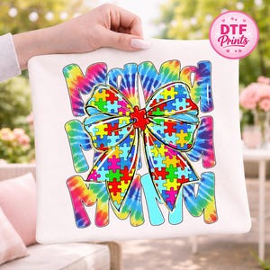 May include: A set of three ceramic mugs with a speckled, matte finish. The mugs are in shades of cream, light gray, and dark gray. Each mug has a simple, minimalist design, perfect for coffee or tea.