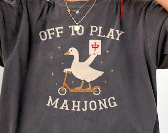 Off to play Mahjong Comfort Colors shirt, silly goose holding a red dragon tile tee, funny girl game night outfit, matching group gaming tee