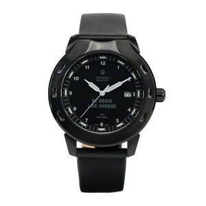 May include: A black wristwatch with a black leather band. The watch face is black with white markings and the text "BE BRAVE LIKE UKRAINE" and "UKRAINIAN MILITARY".