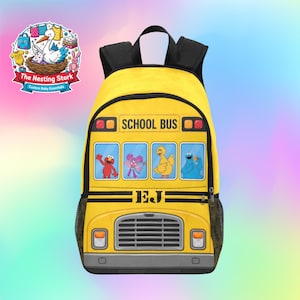 May include: A yellow backpack designed to look like a school bus, featuring black straps and mesh side pockets. The front displays the text SCHOOL BUS and EJ, with illustrations of Elmo, Abby Cadabby, Big Bird, and Cookie Monster in the windows.