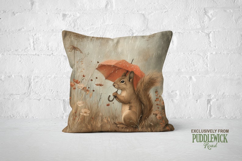 a pillow with a squirrel holding an umbrella