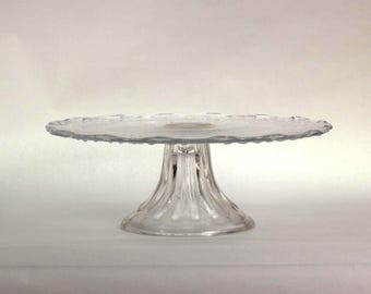 VINTAGE Glass Cake Stand. 9" Pressed Sunburst Pedestal Plate.  Scalloped Edge Dessert Display. Made in USA.