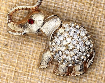 VINTAGE Ruby Eye Elephant Brooch Clear Rhinestones Gold Tone Lucky Animal Pin