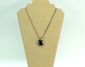 VINTAGE Blue Faceted Crystal Pendant Necklace . Oval Teal Blue Glass Stone . Gold Tone Setting . Snake Chain . Statement Necklace