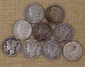 VINTAGE Nine genuine 1943 Mercury dimes — American silver coins minted and circulated in the middle of World War II.