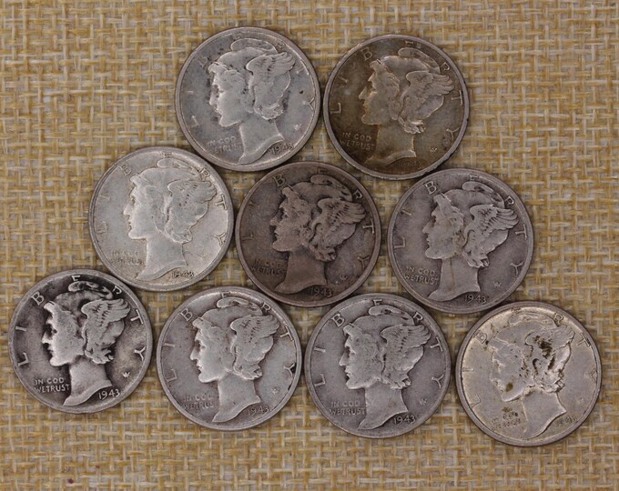 VINTAGE Nine genuine 1943 Mercury dimes — American silver coins minted and circulated in the middle of World War II.