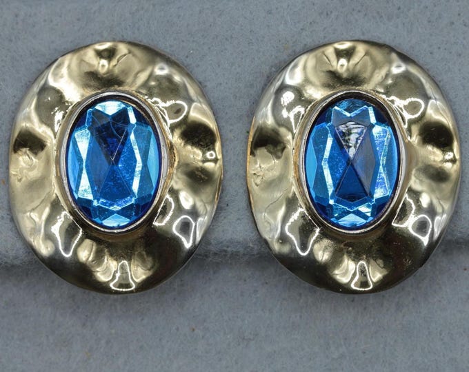 Vintage Gold Tone Blue Faceted Clip-On Earrings, Sapphire Blue Statement Earrings, Hammered Gold Oval Earrings, Retro Costume Jewelry