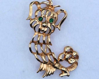 VINTAGE Avon Dog Brooch • Gold Tone Openwork Terrier Pin • Green Rhinestone Eyes • Figural Costume Jewelry