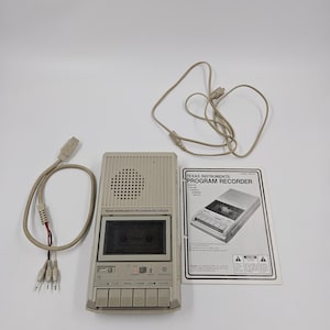 Grabadora de programas PHP2700 de Texas Instruments con manual de reparación