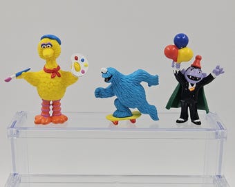 Figuras de PVC vintage de Barrio Sésamo. Lote de Muppets de Jim Henson: el conde, el pájaro grande y el monstruo de las galletas.