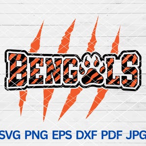 Puede incluir: Diseño de rayas de tigre naranja y negro con la palabra "Bengals" y una huella de pata. El diseño está rodeado de cinco garras naranjas.