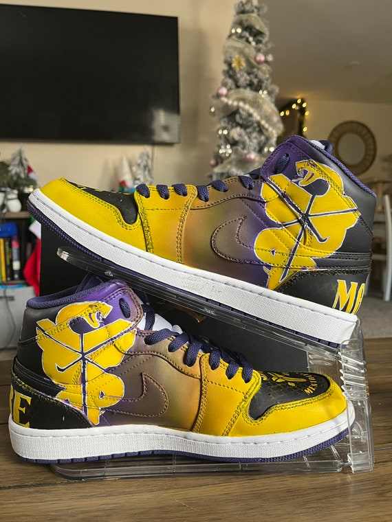 black and yellow high top jordans