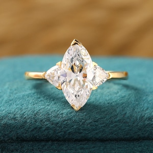 Marquise Lab Grown Diamond Ring: Trillion Cut Three Stone Engagement Ring