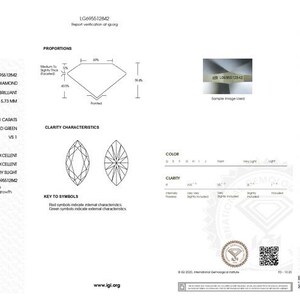 May include: A laboratory-grown diamond report from the International Gemological Institute. The report details a marquise brilliant cut diamond, 21.17 x 9.65 x 5.73 mm, with a fancy vivid green color and VS1 clarity. The report includes diagrams and grading information.