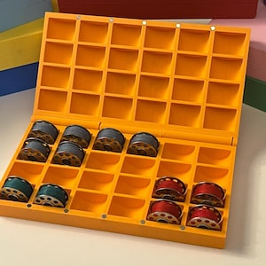 Bobbin Case: Holds 24 Sewing Machine Bobbins