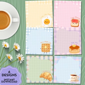May include: A collection of six illustrated notepads with breakfast-themed designs. Each notepad features a different food item, including an egg, toast, waffle, pancakes, croissant, and coffee. The notepads have a grid pattern and the text "Sunny Side Notes", "Sweet Morning", "Warm Waffle Day", "Fluffy Notes", "Croissant Time", and "Coffee Time".