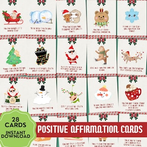 Op de afbeelding: Een verzameling van 28 positieve affirmatiekaarten met feestelijke illustraties en bemoedigende boodschappen. De kaarten bevatten afbeeldingen van sneeuwpoppen, de kerstman en andere personages met een vakantiethema.