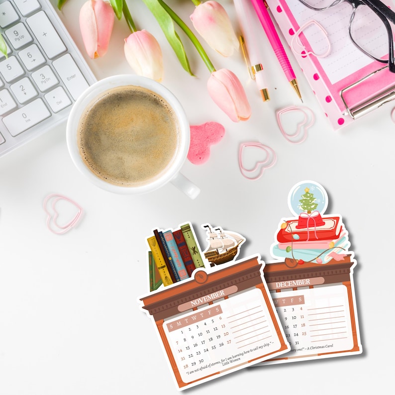 May include: Two die-cut paper calendars for November and December featuring illustrations of stacked books, a sailing ship, and a snow globe with a Christmas tree. The November calendar includes the quote, I am not afraid of storms, for I am learning how to sail my ship.
