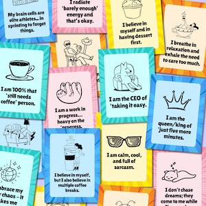 May include: A set of 12 colorful cards with illustrations and text. Each card features a different quote about self-care, relaxation, and taking things easy. The quotes include "I am 100% that 'still needs coffee' person", "I radiate 'barely enough' energy and that's okay", "I am the CEO of 'taking it easy'", "I believe in myself and in having dessert first", "I am a work in progress... heavy on the 'progress'", "I breathe in relaxation and exhale the need to care too much", "I am the queen/king of 'just five more minutes'", "I believe in myself, but I also believe in multiple coffee breaks", "I am calm, cool, and full of sarcasm", "I don't chase dreams; they come to me while", "My brain cells are elite athletes... in sprinting to forget things", and "Embrace my chaos - it makes me".