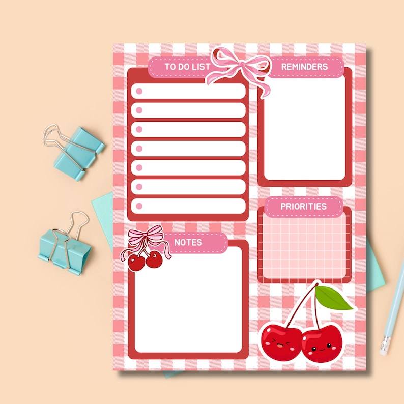 May include: A pink and white gingham patterned planner page with sections for to-do lists, reminders, notes, and priorities. Adorned with cherry and bow illustrations, and light blue binder clips.