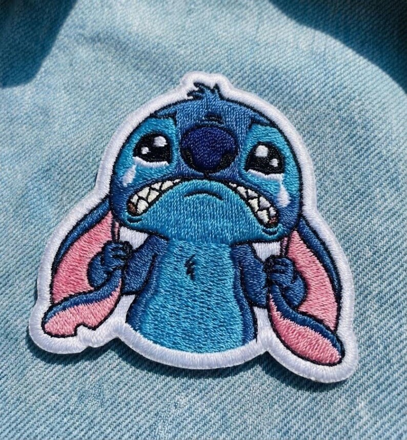 May include: A set of three ceramic mugs with a speckled, matte finish in cream, light grey, and dark grey. Each mug has a simple, minimalist design and a rounded handle.