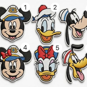 May include: Embroidered patches featuring Disney characters Mickey Mouse, Donald Duck, Goofy, Minnie Mouse, Daisy Duck, and Pluto. Each patch has a black border and depicts the character's face with vibrant colors.