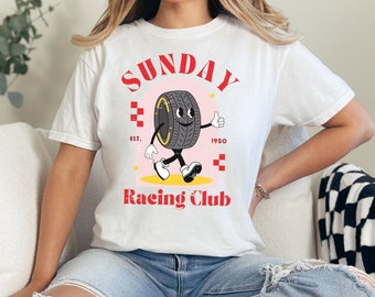 May include: White t-shirt featuring a cartoon tyre with a face and the text "SUNDAY Racing Club" with the words "EST. 1950" below the graphic.