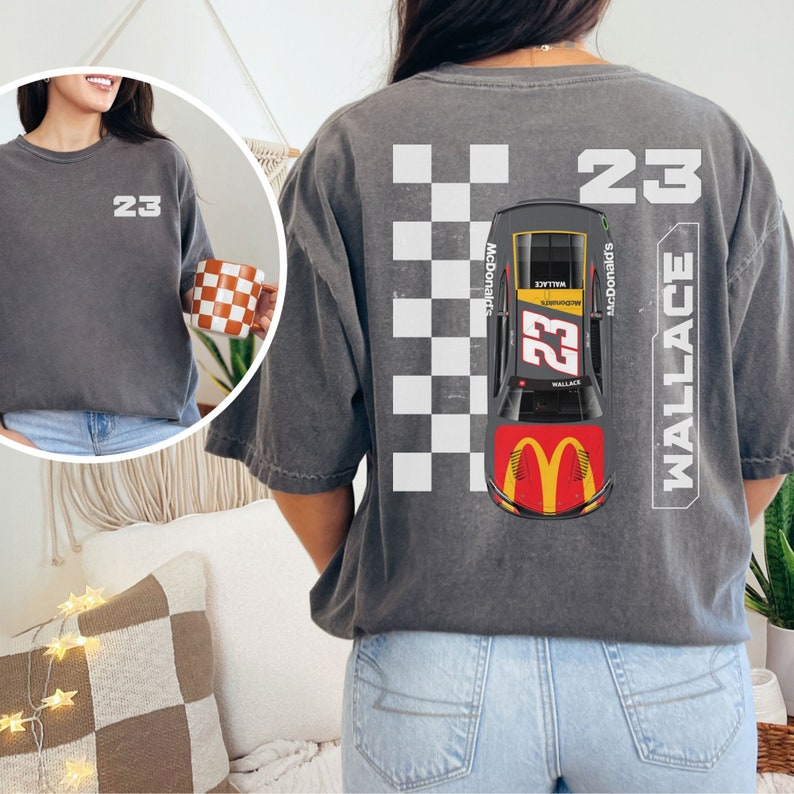 May include: A gray t-shirt with a checkered pattern, a race car, and the text "23 WALLACE" and "McDonald's".