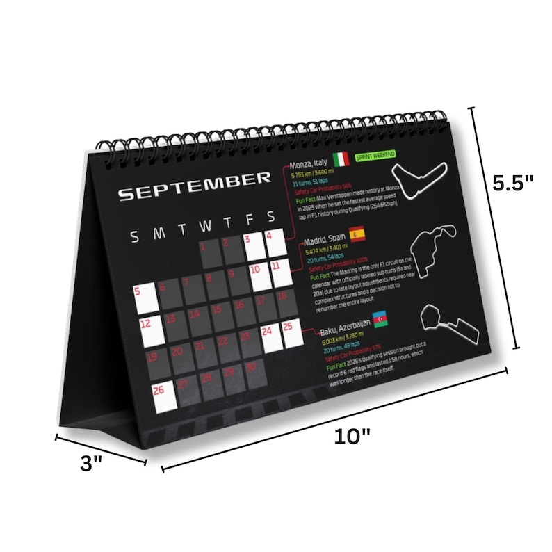 May include: A black spiral-bound desk calendar for September featuring Formula 1 track layouts, race statistics, and flags for Italy, Spain, and Azerbaijan. The calendar measures 25.4 cm wide, 14 cm high, and 7.6 cm deep.