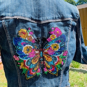 Upcycled denim butterfly sequin jacket with embellished cuffs