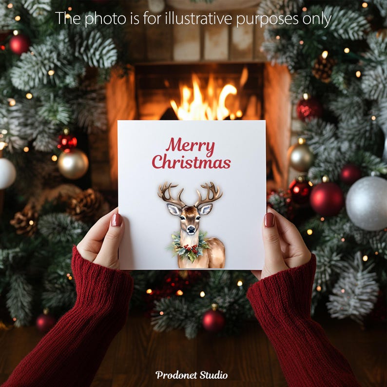 Peut inclure: Une carte blanche avec le texte "Merry Christmas" en lettres rouges. Une illustration aquarelle d'un cerf brun avec des bois portant une couronne verte autour du cou est sur la carte.