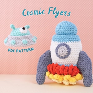 May include: Crochet pattern for a spaceship and a flying saucer. The spaceship is blue, white, and red with a gray window. The flying saucer is green and gray with a white eye. The pattern is called "Cosmic Flyers" and is available as a PDF download.