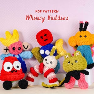 May include: A collection of colorful, handmade crochet toys. The toys include a red creature with large eyes, a pink and yellow crowned figure, a caterpillar, a yellow cat-like figure, and a butterfly. The text "PDF PATTERN Whimsy Buddies" is at the top.