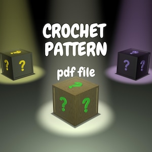 May include: Crochet pattern PDF file for a mystery box. The image shows three boxes with question marks on each side. The boxes are black, brown, and purple.