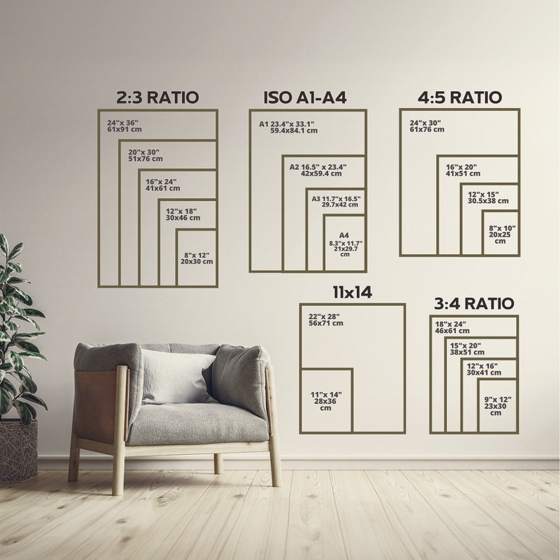 May include: A wall display showcasing various print sizes and ratios, including 2:3, ISO A1-A4, 4:5, 11x14, and 3:4. Each ratio is labeled with dimensions in inches and centimeters. A modern armchair and a plant are in the foreground.